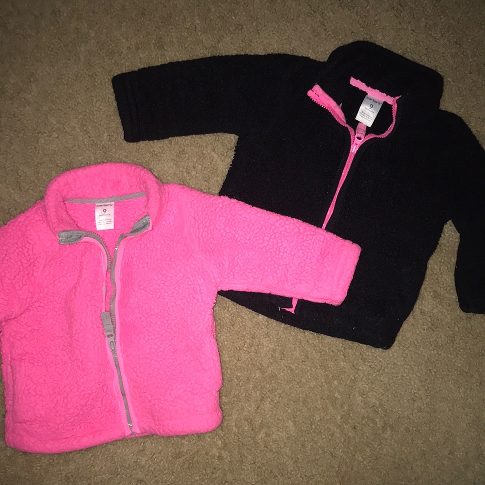 Two zip up sweaters